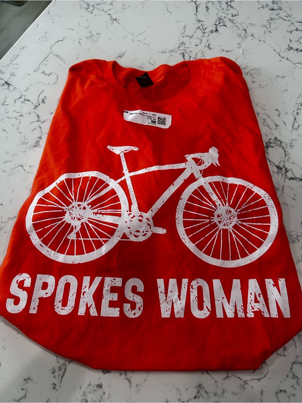 Orange "Spokes Woman" Bicycle Graphic Tee